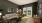 spacious living room with wood-style flooring and a connected kitchen area