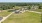 overview shot of large field with ampitheater
